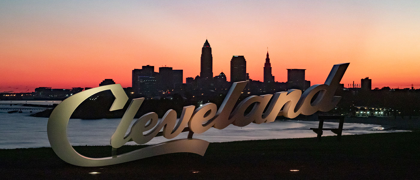 Cleveland sign and skyline at dusk.